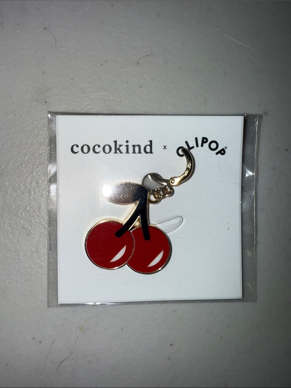 cocokind x OLIPOP Cherry Cola Lip Charm
